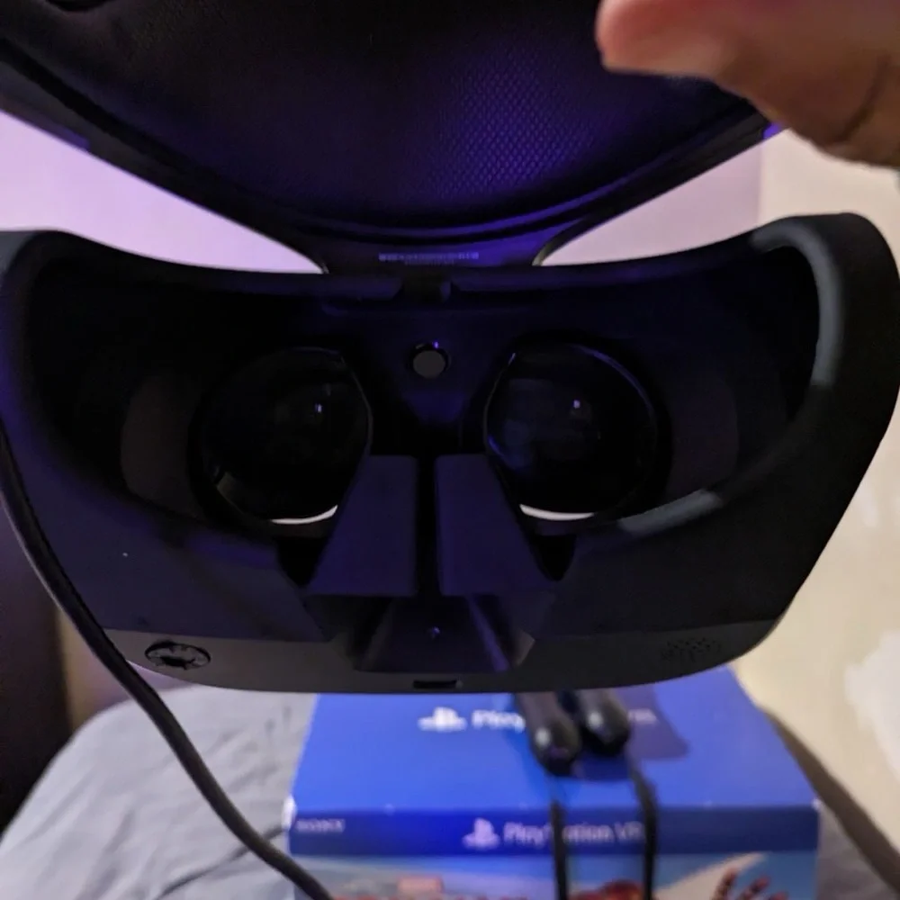 hardly used VR with the two controllers and all the cords with Spider-Man VR